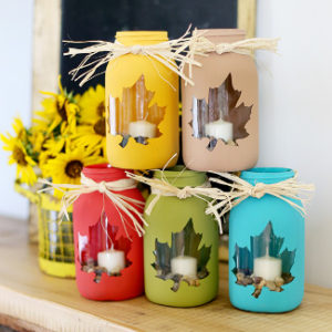 Bright colorful jars with maple leaf patern for candles