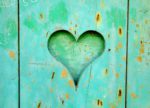 Heart in turquoise door