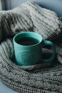 Cup of coffee on a blanket